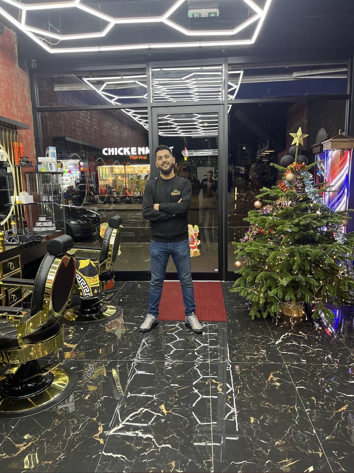 Gold barber chairs at Zaza Fade